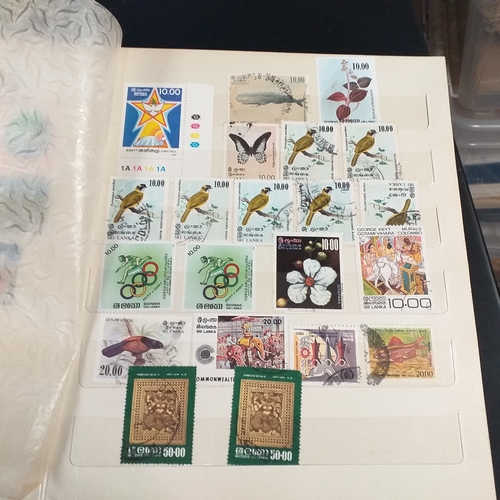 12 - Box: 6 Stock books and albums, contain collections from Jamaica, Malaysia, Football thematics and 2 ... 