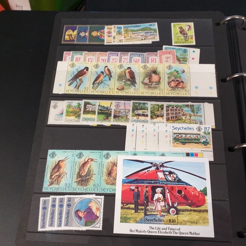 12 - Box: 6 Stock books and albums, contain collections from Jamaica, Malaysia, Football thematics and 2 ... 