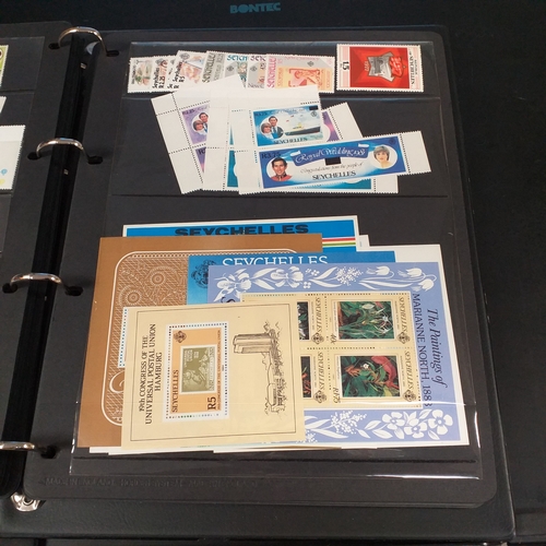 12 - Box: 6 Stock books and albums, contain collections from Jamaica, Malaysia, Football thematics and 2 ... 