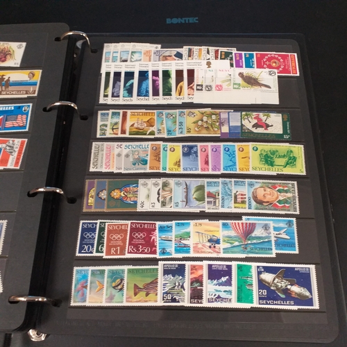 12 - Box: 6 Stock books and albums, contain collections from Jamaica, Malaysia, Football thematics and 2 ... 