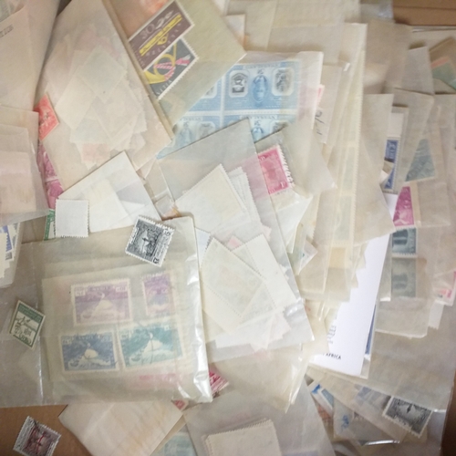 19 - Glory box - containing a quantity of world stamps in glassine envelopes mint/used - sets and singles