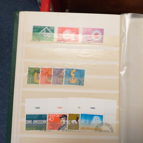 35 - Box of albums and stock books housing commonwealth and world collections, viewing required