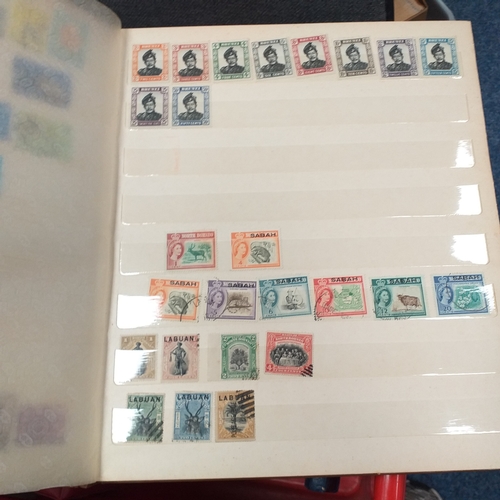 35 - Box of albums and stock books housing commonwealth and world collections, viewing required