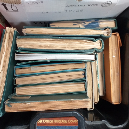 24 - Black plastic carton housing a small collection of albums and bags of stamps/covers etc, mostly SE A... 