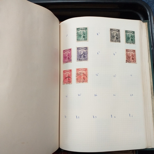 24 - Black plastic carton housing a small collection of albums and bags of stamps/covers etc, mostly SE A... 
