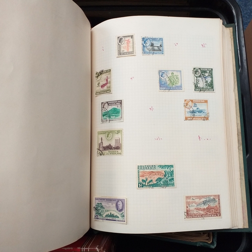 24 - Black plastic carton housing a small collection of albums and bags of stamps/covers etc, mostly SE A... 