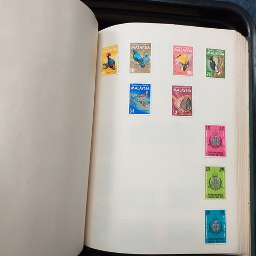 24 - Black plastic carton housing a small collection of albums and bags of stamps/covers etc, mostly SE A... 