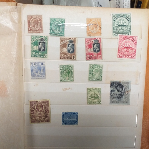 24 - Black plastic carton housing a small collection of albums and bags of stamps/covers etc, mostly SE A... 