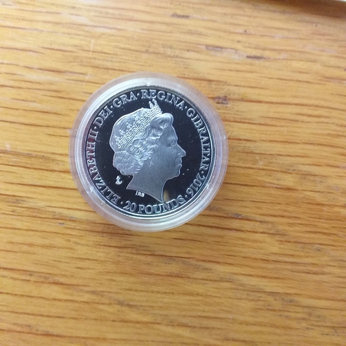 14 - Plastic container holding a small odds and ends collection of Gibraltar Crowns and small white metal... 