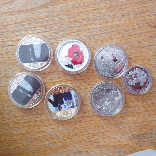 14 - Plastic container holding a small odds and ends collection of Gibraltar Crowns and small white metal... 