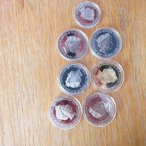 14 - Plastic container holding a small odds and ends collection of Gibraltar Crowns and small white metal... 