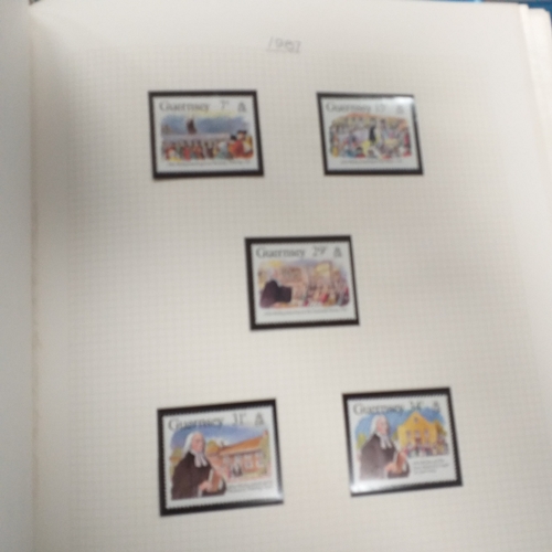 20 - Storage box housing a collection of albums includes Tuvalu, Guernsey, Singapore, South Africa, Israe... 