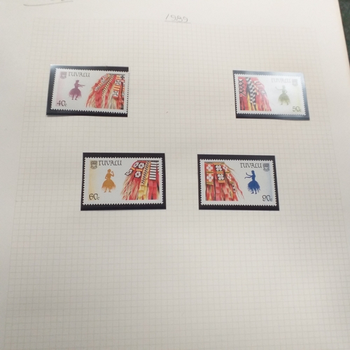 20 - Storage box housing a collection of albums includes Tuvalu, Guernsey, Singapore, South Africa, Israe... 