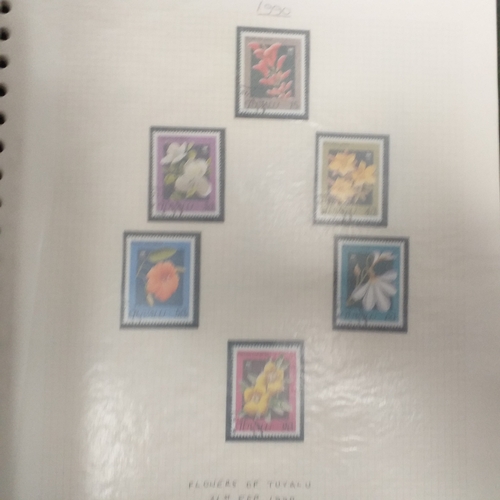 20 - Storage box housing a collection of albums includes Tuvalu, Guernsey, Singapore, South Africa, Israe... 