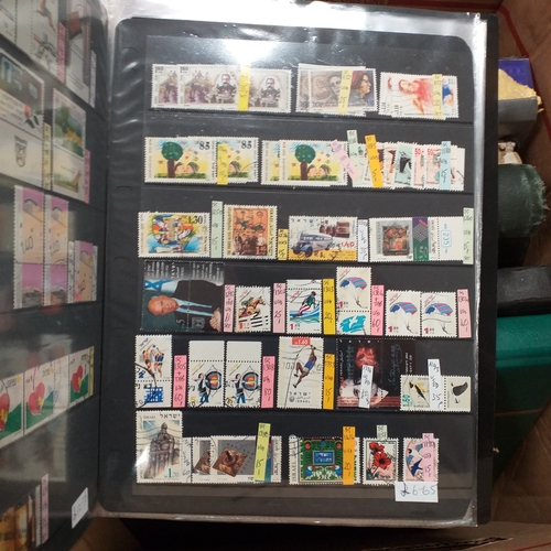20 - Storage box housing a collection of albums includes Tuvalu, Guernsey, Singapore, South Africa, Israe... 
