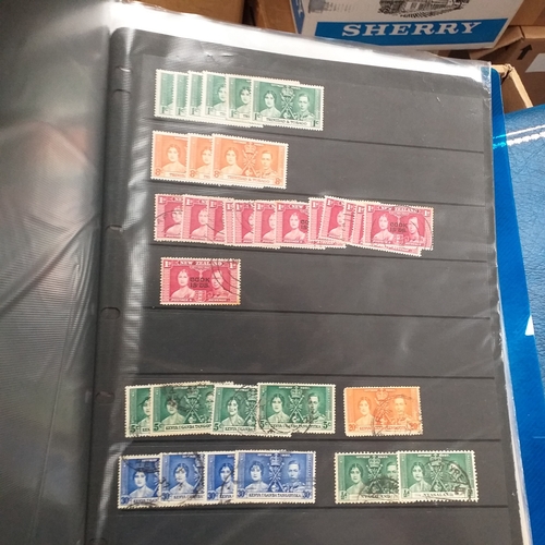 20 - Storage box housing a collection of albums includes Tuvalu, Guernsey, Singapore, South Africa, Israe... 