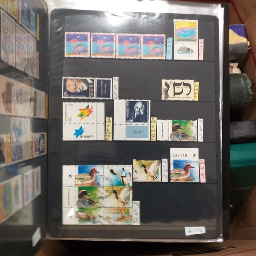 20 - Storage box housing a collection of albums includes Tuvalu, Guernsey, Singapore, South Africa, Israe... 