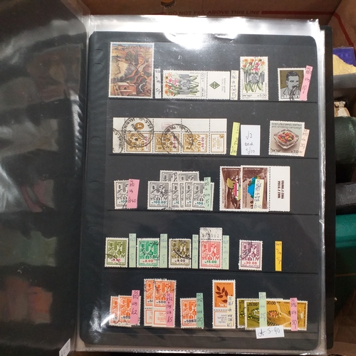 20 - Storage box housing a collection of albums includes Tuvalu, Guernsey, Singapore, South Africa, Israe... 