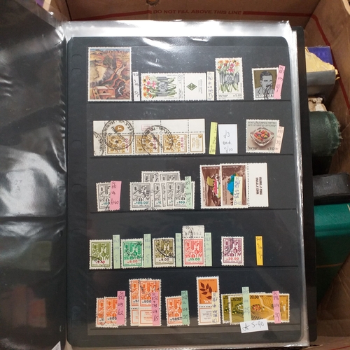 20 - Storage box housing a collection of albums includes Tuvalu, Guernsey, Singapore, South Africa, Israe... 