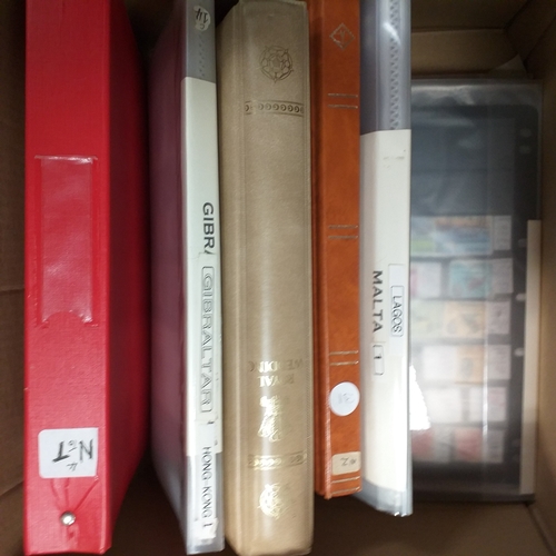 20 - Storage box housing a collection of albums includes Tuvalu, Guernsey, Singapore, South Africa, Israe... 