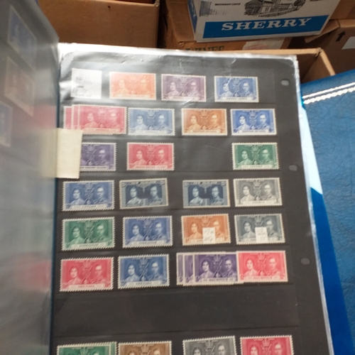 20 - Storage box housing a collection of albums includes Tuvalu, Guernsey, Singapore, South Africa, Israe... 