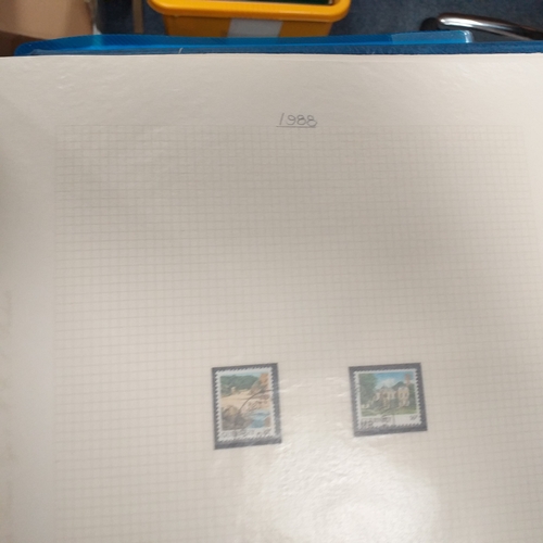 20 - Storage box housing a collection of albums includes Tuvalu, Guernsey, Singapore, South Africa, Israe... 