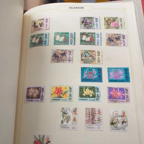 21 - Storage box housing a collection of albums includes South Africa, USA, Greece, Germany, GB, world se... 