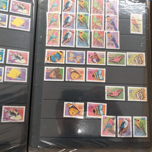 21 - Storage box housing a collection of albums includes South Africa, USA, Greece, Germany, GB, world se... 