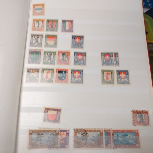 25 - Box of albums housing world collections mint and used bulk of issues are European with good selectio... 