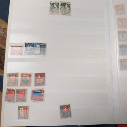25 - Box of albums housing world collections mint and used bulk of issues are European with good selectio... 