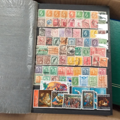 29 - Box containing 5 collections. New Zealand from early to modern used in 8 page stock book, South Afri... 