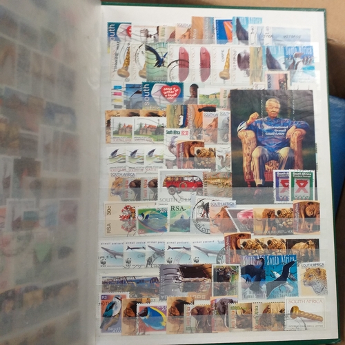29 - Box containing 5 collections. New Zealand from early to modern used in 8 page stock book, South Afri... 