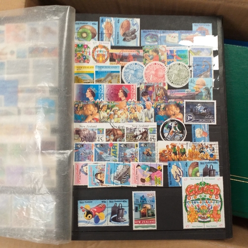 29 - Box containing 5 collections. New Zealand from early to modern used in 8 page stock book, South Afri... 