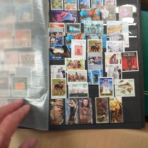 29 - Box containing 5 collections. New Zealand from early to modern used in 8 page stock book, South Afri... 