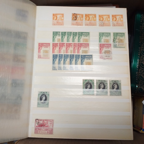 30 - Glory box housing World/Commonwealth on album leaves, Hagners, stamps in cigar boxes and tins. 3 sto... 