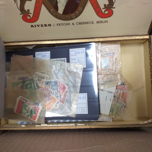 30 - Glory box housing World/Commonwealth on album leaves, Hagners, stamps in cigar boxes and tins. 3 sto... 