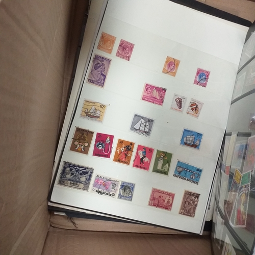 30 - Glory box housing World/Commonwealth on album leaves, Hagners, stamps in cigar boxes and tins. 3 sto... 