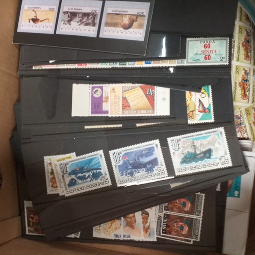 32 - Glory box full of world stamps unsorted in chocolate boxes and tins. 1000's of stamps, well worth a ... 