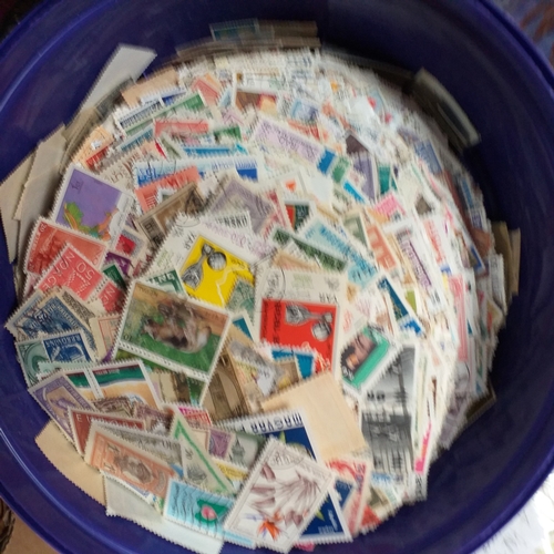 32 - Glory box full of world stamps unsorted in chocolate boxes and tins. 1000's of stamps, well worth a ... 