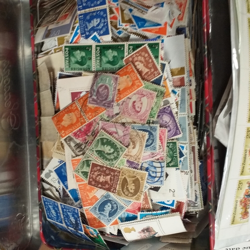 32 - Glory box full of world stamps unsorted in chocolate boxes and tins. 1000's of stamps, well worth a ... 