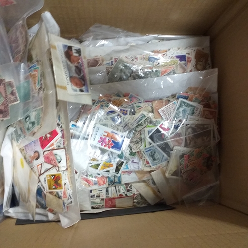 38 - Box containing stamps in packets (all off paper and sorted in to countries) on stock cards, album le... 