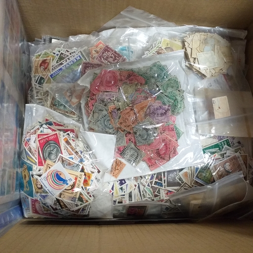 38 - Box containing stamps in packets (all off paper and sorted in to countries) on stock cards, album le... 