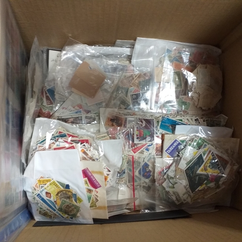38 - Box containing stamps in packets (all off paper and sorted in to countries) on stock cards, album le... 