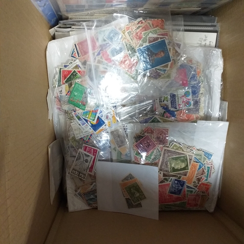 38 - Box containing stamps in packets (all off paper and sorted in to countries) on stock cards, album le... 