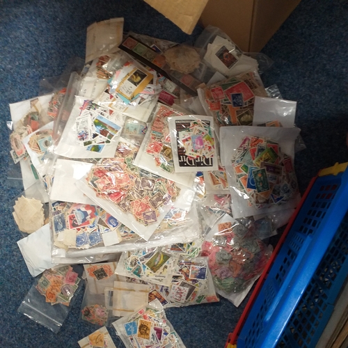 38 - Box containing stamps in packets (all off paper and sorted in to countries) on stock cards, album le... 