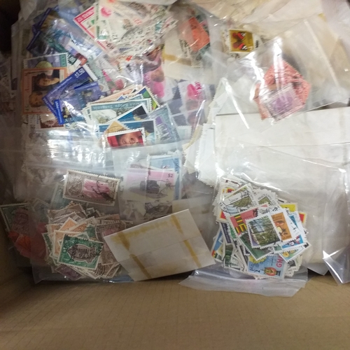 38 - Box containing stamps in packets (all off paper and sorted in to countries) on stock cards, album le... 