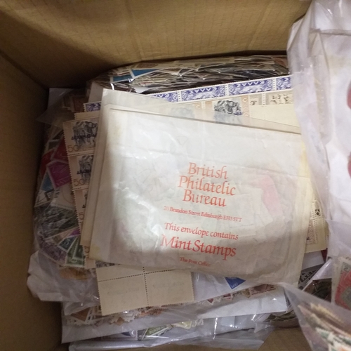 38 - Box containing stamps in packets (all off paper and sorted in to countries) on stock cards, album le... 