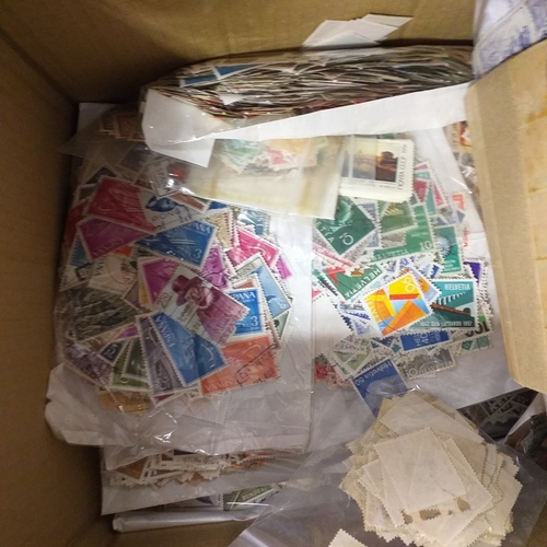 38 - Box containing stamps in packets (all off paper and sorted in to countries) on stock cards, album le... 