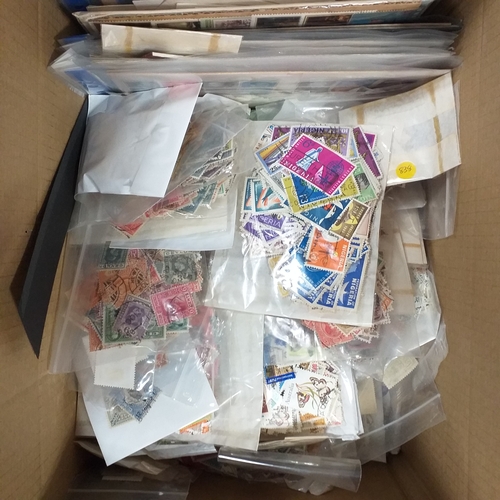 38 - Box containing stamps in packets (all off paper and sorted in to countries) on stock cards, album le... 