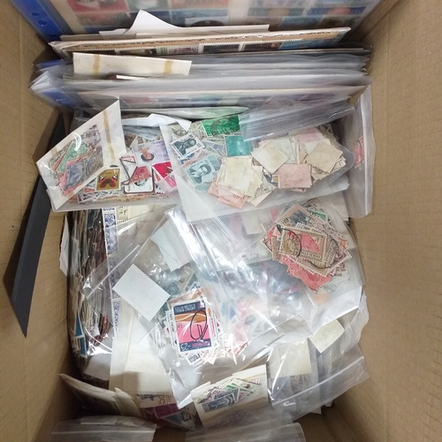 38 - Box containing stamps in packets (all off paper and sorted in to countries) on stock cards, album le... 